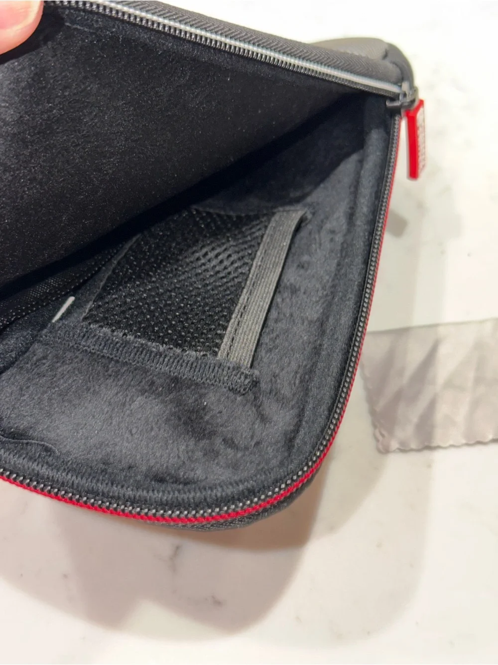 Nintendo Switch Gray Travel Case with Red Logo Accent